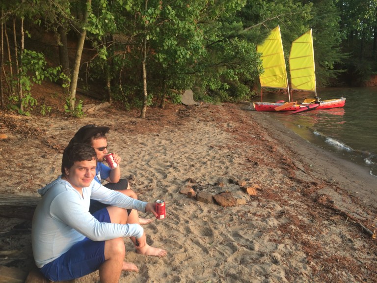 James and Alex relaxing on an uninhabited island in Lake Sydney Lanier.  Steadfast sits ready for launch in the background.