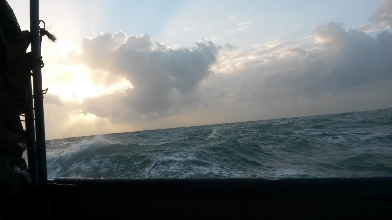 Sun rising over the Caribbean swells