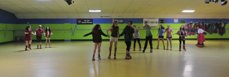 Enjoying some good old 90's entertainment with the OME15 crew: celebrating Christmas in July at the roller rink